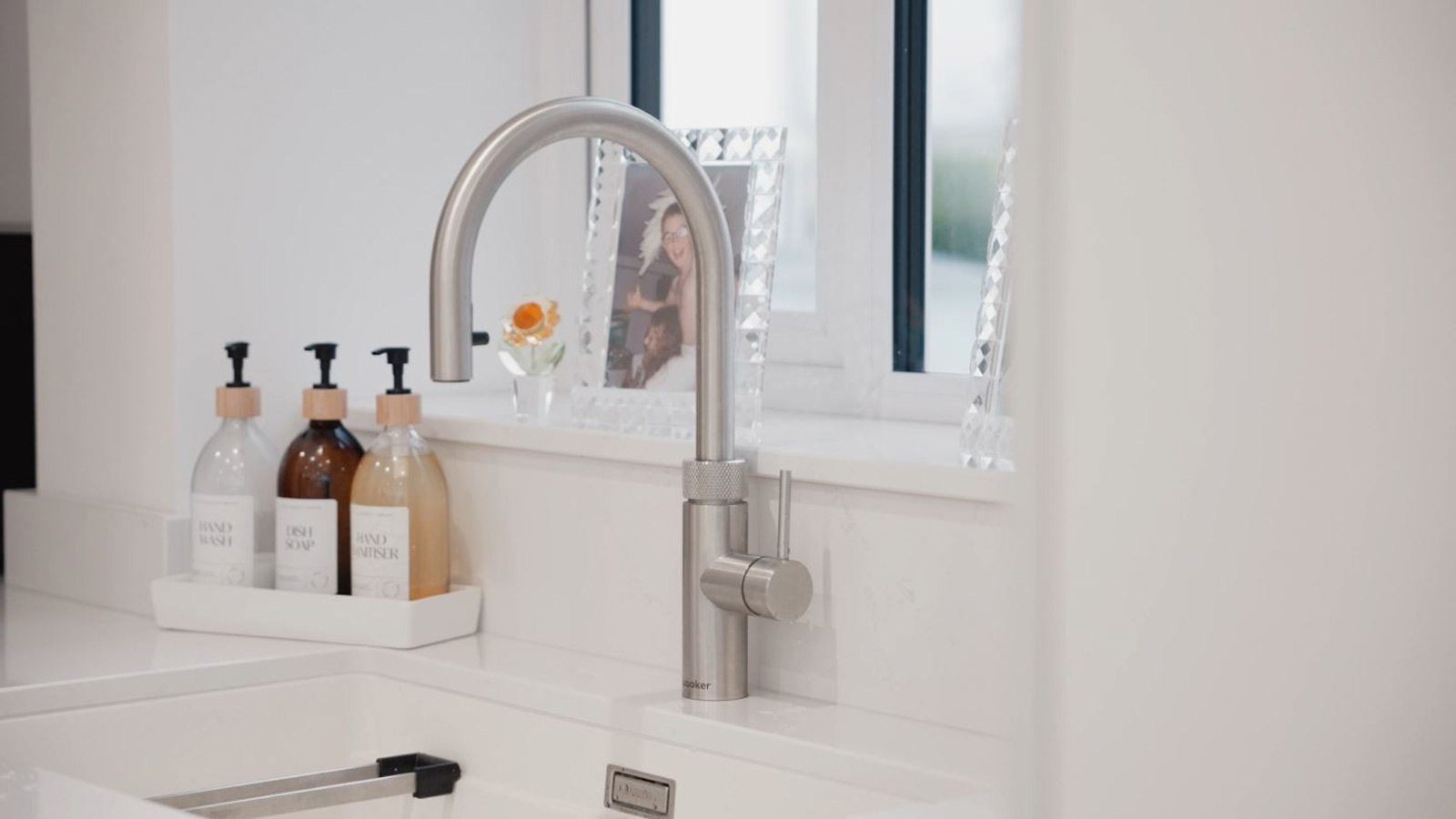 A hot water tap including Quooker tap technology, a leader in boiling water taps