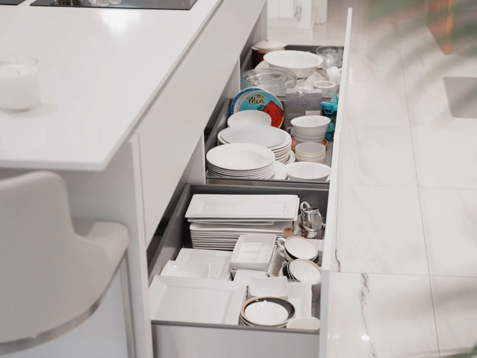 Extra wide kitchen drawers set in an inviting kitchen for entertaining