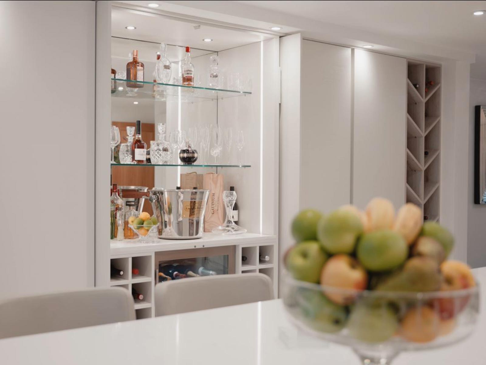 A hidden home bar with a secret drinks cabinet built into a childproof kitchen