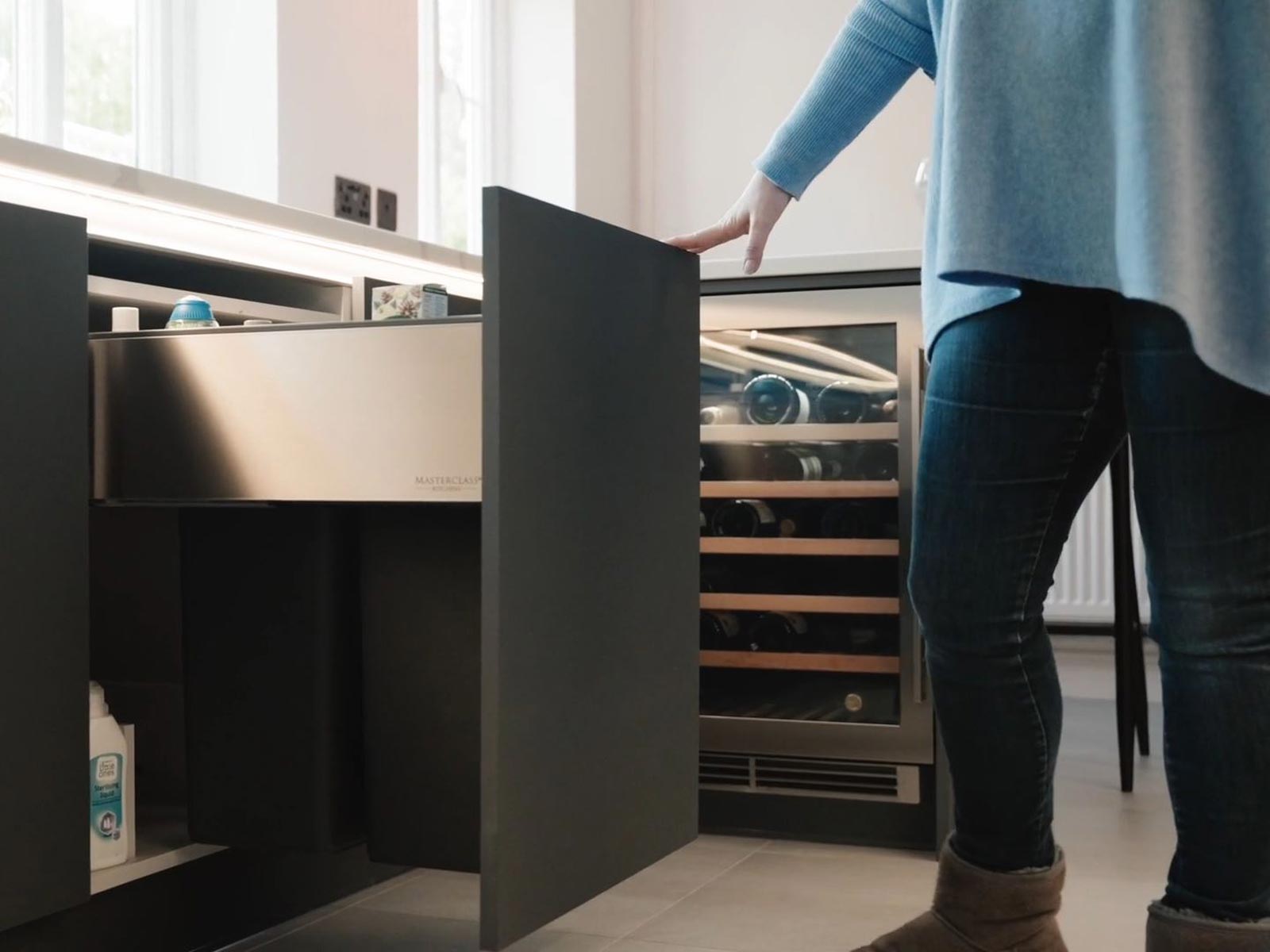 An integrated kitchen bin drawer with 2 compartments for inside cupboard