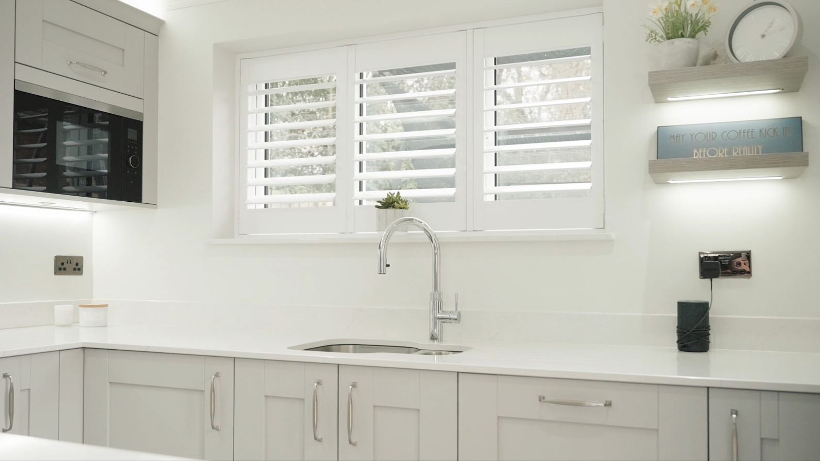 A minimalist kitchen featuring lots of under-counter storage ideas