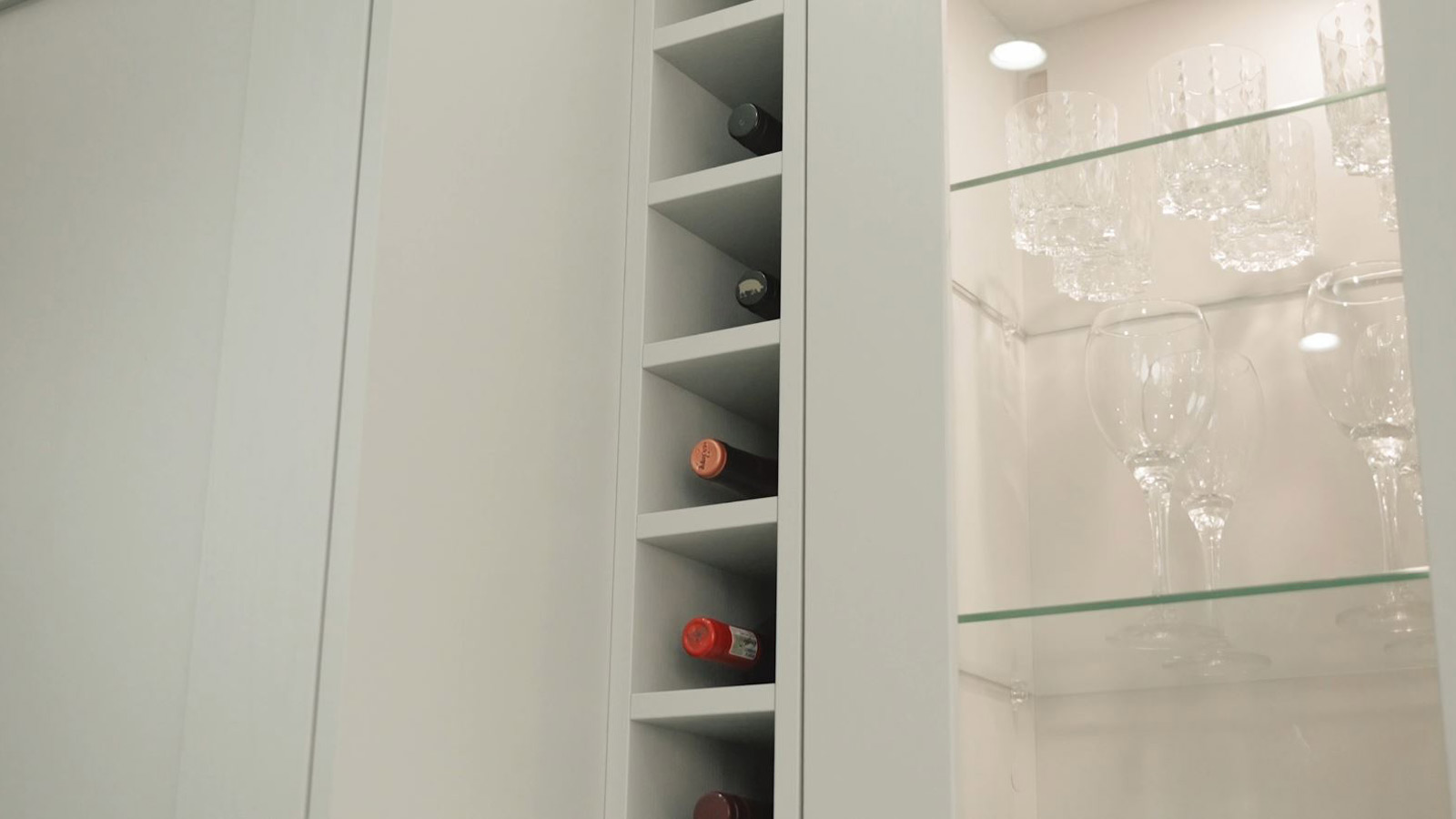 A kitchen wine storage idea shown as an integrated kitchen wine rack